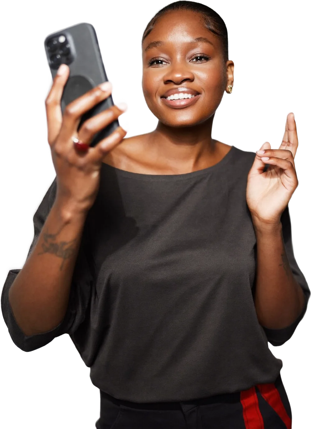 Business owner smiling while filming a video for her website and ads on her phone